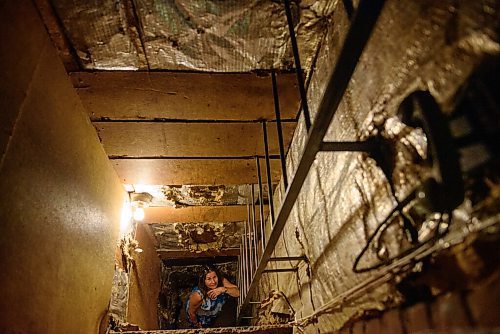 JESSE BOILY  / WINNIPEG FREE PRESS
Melissa Gauthier looks up the ladder to the pin setting machines at Roxy Lanes bowling alley on Wednesday. The couple has owned the bowling alley for 11 years. The building being over 90 years old has become a museum of days past in the building that once was a theatre. The basement is full of artifacts from the past. Wednesday, July 15, 2020.
Reporter: Dave Sanderson