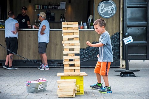 MIKAELA MACKENZIE / WINNIPEG FREE PRESS

Duke Lewis, five, plays jenga at the Cargo Bar in Assiniboine Park in Winnipeg on Friday, July 17, 2020. For Jen Zoratti Take 5 story.
Winnipeg Free Press 2020.