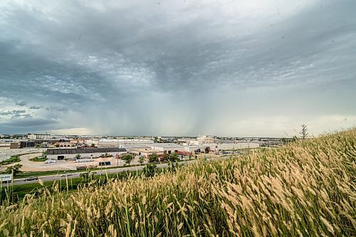 Mike Sudoma / Winnipeg Free Press
Storm clouds take over the skies above Winnipeg as a thunderstorm approaches from the West of Garbage Hill Friday afternoon
July 17, 2020