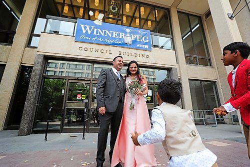 RUTH BONNEVILLE / WINNIPEG FREE PRESS

LOCAL - 1st city hall wedding since COVID 

Ankita  and her groom, Harman Mavi share their vows, first kiss and wedding day with close family at City Hall on Friday. 

Story: Ankita and Harman (groom) Mavi are the first couple to have their wedding at City Hall since the start of COVID. Reporter talking to the first couple to get married at City Hall since that option closed during the pandemic. 

The short ceremony with close family began at  12 p.m on the Mayors foyer (second floor of city council building) on Friday. 

Gabrielle Piché story.

July 17th, 2020