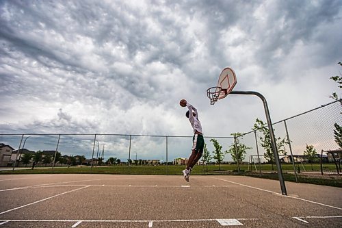 MIKAELA MACKENZIE / WINNIPEG FREE PRESS

Brendan Amoyaw, 16, practices on the court as a storm rolls in at Ron Duhamel Park in Sage Creek in Winnipeg on Friday, July 17, 2020. Standup.
Winnipeg Free Press 2020.