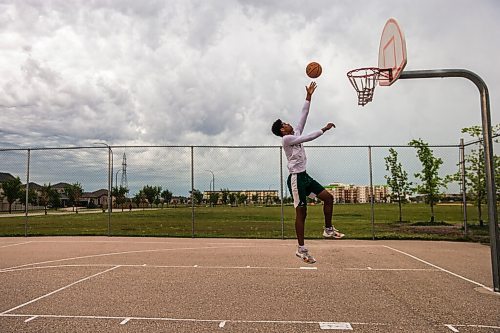 MIKAELA MACKENZIE / WINNIPEG FREE PRESS

Brendan Amoyaw, 16, practices on the court as a storm rolls in at Ron Duhamel Park in Sage Creek in Winnipeg on Friday, July 17, 2020. Standup.
Winnipeg Free Press 2020.