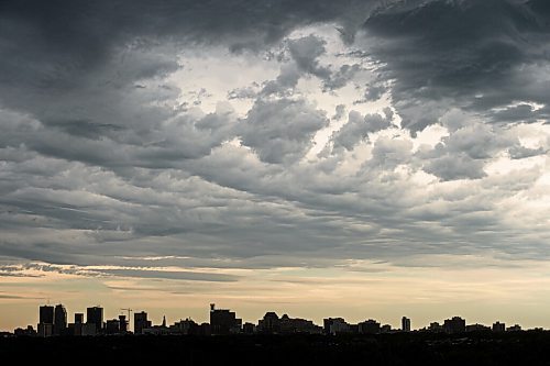Mike Sudoma / Winnipeg Free Press
The skyline of Downtown Winnipeg as seen from Garbage Hill as Storm clouds take over the skies above Friday afternoon
July 17, 2020