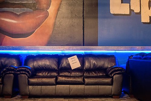 Mike Sudoma / Winnipeg Free Press
An Out of Order sign sticks to a couch along the stage side inside Lipstixx Experience Nightclub Saturday afternoon, indicating social distance practices.
July 18, 2020