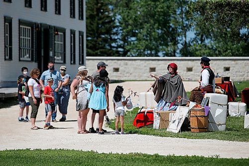 JOHN WOODS / WINNIPEG FREE PRESS
Park visitors listen in as interpreters tell the history of Lower Fort Garry Sunday, July 19, 2020. The park opened to visitors on Tuesday.

Reporter: desilva
