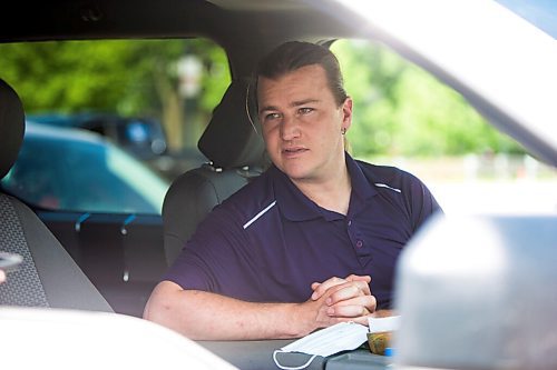 MIKAELA MACKENZIE / WINNIPEG FREE PRESS

Tyler Vandervis speaks to the Free Press while waiting to get tested at the drive-through COVID-19 testing site on Main Street in Winnipeg on Tuesday, July 21, 2020. For Malak Abas story.
Winnipeg Free Press 2020.