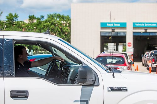 MIKAELA MACKENZIE / WINNIPEG FREE PRESS

Tyler Vandervis waits to get tested at the drive-through COVID-19 testing site on Main Street in Winnipeg on Tuesday, July 21, 2020. For Malak Abas story.
Winnipeg Free Press 2020.