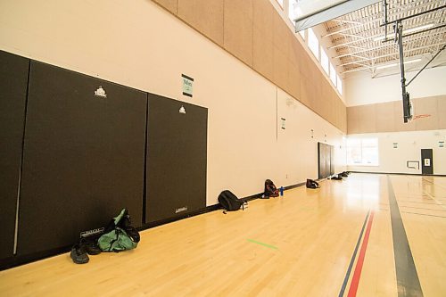 Mike Sudoma / Winnipeg Free Press
To be physically distant, locker rooms at Attack Basketball Camp held at Amber Trails Community School were closed off, so camp participants set up locker spaces along the gym walls. The makeshift locker rooms were six feet apart, allowing athletes to keep their stuff in a safe place while following social distancing guidelines.
July 21, 2020