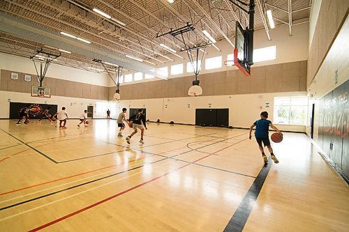 Mike Sudoma / Winnipeg Free Press
Attack Basketball Camp participants run a drill as they stay in their lanes, staying safely spaced apart from one another Tuesday afternoon
July 21, 2020