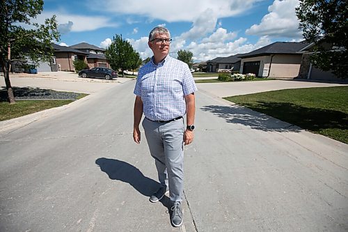 JOHN WOODS / WINNIPEG FREE PRESS
Christopher Storie, Director of the Institute of Urban Studies at the University of Winnipeg, is photographed at Sage Creek development Tuesday, July 21, 2020. Winnipeg continues to take up more space as urban sprawl continues as new urban developments continue to be built further from the downtown core.

Reporter: Sarah