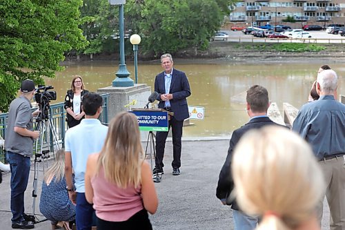 RUTH BONNEVILLE / WINNIPEG FREE PRESS

Local -  Pallister, - Grow Trust Presser 

Photos of news conference with Premier Brian Pallister Conservation and Climate  Minister Sarah Guillemard along with Jodi Goerzen, manager, Seine Rate River Conservation District (in dress), next to the Assiniboine River (lower river walkway level, south of the Legislative Building grounds, between the Louis Riel statue and the river walk), where the Premier made announcement regarding GROW Trust on Wednesday. 

See story. 
    
July 22nd,, 2020