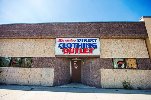 MIKAELA MACKENZIE / WINNIPEG FREE PRESS

Surplus Direct Clothing Outlet in Winnipeg on Wednesday, July 22, 2020. Owner Robert McDonald is concerned about cars lined up in front of his business for the nearby drive through COVID-19 testing site. For Malak Abas story.
Winnipeg Free Press 2020.