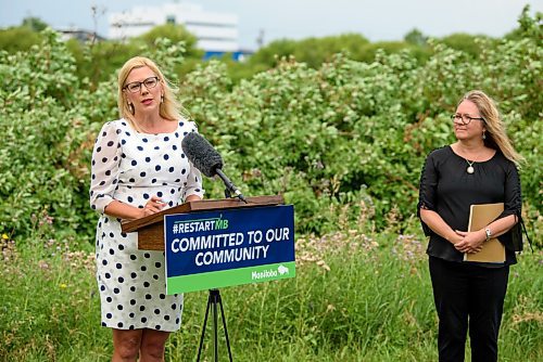 JESSE BOILY  / WINNIPEG FREE PRESS
Municipal Relations Minister Rochelle Squires, left, and Colleen Sklar, executive director of Winnipeg Metropolitan Region Municipal Relations, announced a 15 million dollar commitment to build up local infrastructures at the Lyndale Drive Park on Thursday. Among the projects is a 4.6 million stabilization plan along the river next to Lyndale Drive. Thursday, July 23, 2020.
Reporter: Sarah