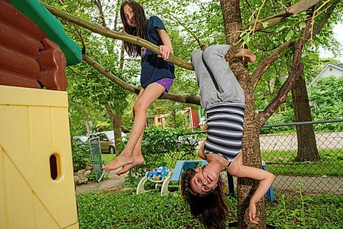 JESSE BOILY  / WINNIPEG FREE PRESS
Twins Kimber, left, and Auryla Louis play in their yard at their home on Thursday. The twins received the Sunshine Fund which allow them to go to camp. Thursday, July 23, 2020.
Reporter: Nadya