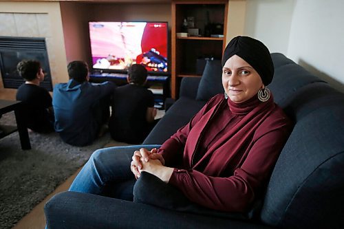 JOHN WOODS / WINNIPEG FREE PRESS
Nermeen Saad is photographed with her video game playing sons in Winnipeg Thursday, July 23, 2020. Saad says her sons buy in-game purchases when they play their games.

Reporter: Schlesinger
