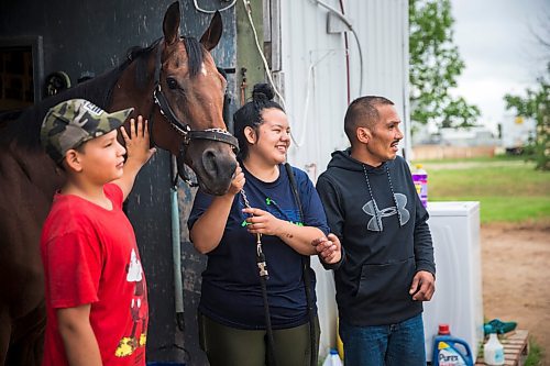 MIKAELA MACKENZIE / WINNIPEG FREE PRESS

Stakes winner Labhay with Jerry Gourneau barn team members (left-right) Drake Peters, Madison Tirk, and Sheldon Chickeness at the Assiniboia Downs backstretch in Winnipeg on Friday, July 24, 2020. For George Williams story.
Winnipeg Free Press 2020.