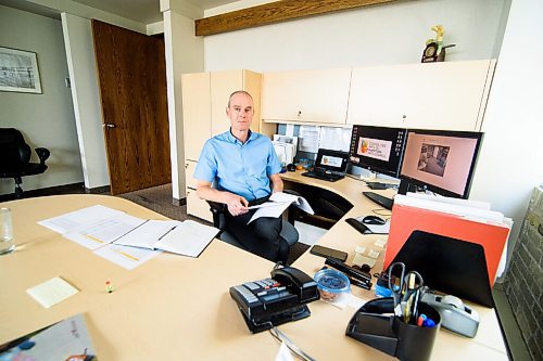 Mike Sudoma / Winnipeg Free Press
Randy Joynt, Executive Director of the Manitoba Arts Council, looks over Manitobas Cultural Action plan at his desk Friday afternoon
July 24, 2020