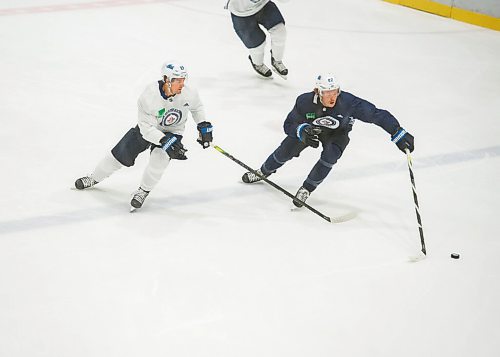 Mike Sudoma / Winnipeg Free Press
Winnipeg Jets Centre, Mark Scheifele, chases down Right Wing, Mason Appleton during practice at the Iceplex Saturday morning
July 25, 2020