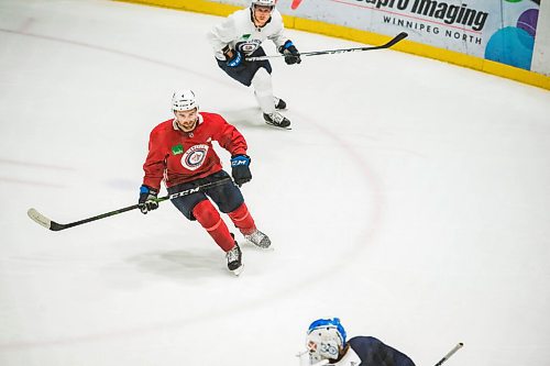 Mike Sudoma / Winnipeg Free Press
Winnipeg Jets defense, Neal Pionk (left) during practice at the Iceplex Saturday morning
July 25, 2020