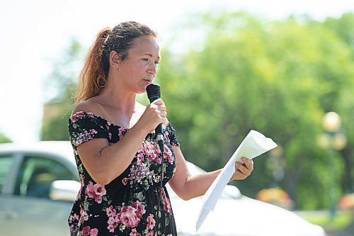 Mike Sudoma / Winnipeg Free Press
Tanya Hall, a speaker at The Lines Saturday afternoon rally, reads aloud emails she has sent to various levels of government about the CoVid virus/restrictions
July 24, 2020