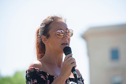 Mike Sudoma / Winnipeg Free Press
Tanya Hall, a speaker at The Lines Saturday afternoon rally, talks to other supporters about how CoVid restrictions have impacted her and her business.
July 24, 2020