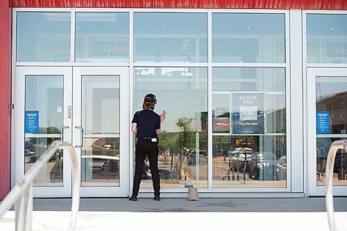 Mike Sudoma / Winnipeg Free Press
An employee cleans the windows and sanitizes the doors to Scotiabank Theatre at Polo Park Saturday afternoon as the theatre reopens to the public for the first time since the CoVid lockdown
July 25, 2020