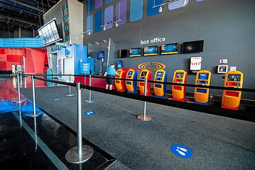 Mike Sudoma / Winnipeg Free Press
A Movie goer uses a kiosk to purchases a movie ticket at Scotiabank Theatre at Polo Park Saturday afternoon
July 25, 2020