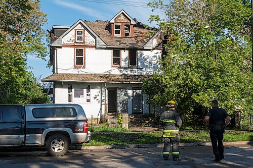 MIKE DEAL / WINNIPEG FREE PRESS
A house in the 200 block of Austin Street North in Point Douglas sustained major damage to its third floor. A firefighter was also reported to have been injured during the rescue of a person trapped in the the building. 
200727 - Monday, July 27, 2020.