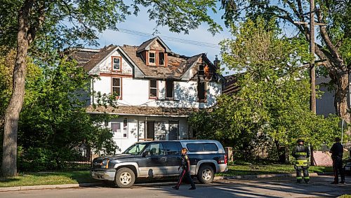 MIKE DEAL / WINNIPEG FREE PRESS
A house in the 200 block of Austin Street North in Point Douglas sustained major damage to its third floor. A firefighter was also reported to have been injured during the rescue of a person trapped in the the building. 
200727 - Monday, July 27, 2020.