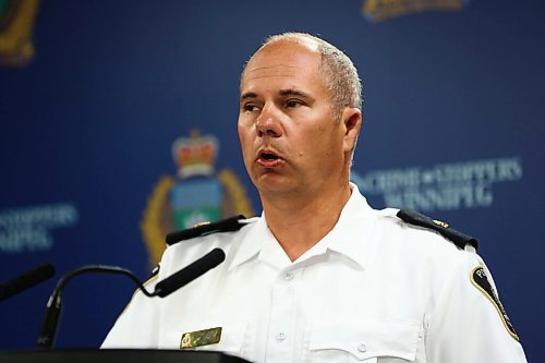 MIKE DEAL / WINNIPEG FREE PRESS

Inspector Shawn Pike of the Major Crimes Division releases information about a months long investigation into organized crime that has resulted in murder, weapons, and drug charges, during a press conference at the Police HQ Monday morning. 
200727 - Monday, July 27, 2020