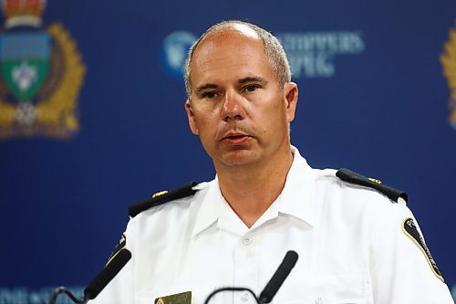 MIKE DEAL / WINNIPEG FREE PRESS

Inspector Shawn Pike of the Major Crimes Division releases information about a months long investigation into organized crime that has resulted in murder, weapons, and drug charges, during a press conference at the Police HQ Monday morning. 
200727 - Monday, July 27, 2020