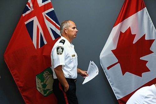 MIKE DEAL / WINNIPEG FREE PRESS

Inspector Shawn Pike of the Major Crimes Division releases information about a months long investigation into organized crime that has resulted in murder, weapons, and drug charges, during a press conference at the Police HQ Monday morning. 
200727 - Monday, July 27, 2020