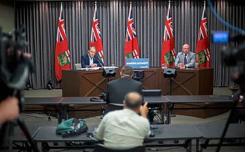 MIKE DEAL / WINNIPEG FREE PRESS
Health, Seniors and Active Living Minister Cameron Friesen and Dr. Brent Roussin, chief provincial public health officer, during the provinces latest COVID-19 update Monday afternoon in the Manitoba Legislative building. 
200727 - Monday, July 27, 2020.