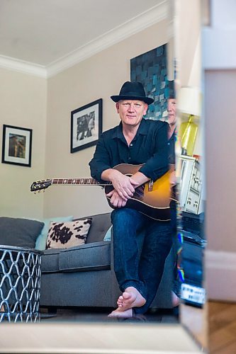 MIKAELA MACKENZIE / WINNIPEG FREE PRESS

Roots rock performer Mark Reeves poses for a portrait in his home in Winnipeg on Monday, July 27, 2020. For Dave Sanderson story.
Winnipeg Free Press 2020.