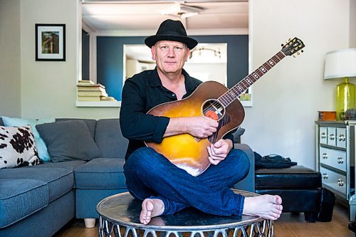 MIKAELA MACKENZIE / WINNIPEG FREE PRESS

Roots rock performer Mark Reeves poses for a portrait in his home in Winnipeg on Monday, July 27, 2020. For Dave Sanderson story.
Winnipeg Free Press 2020.