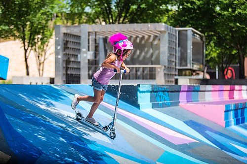 MIKAELA MACKENZIE / WINNIPEG FREE PRESS

Ella Smith, six, takes her scooter for a spin at The Forks in Winnipeg on Tuesday, July 28, 2020. Standup.
Winnipeg Free Press 2020.