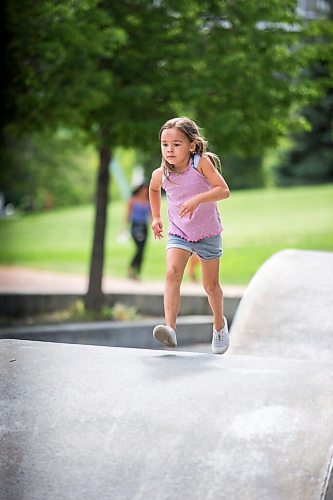 MIKAELA MACKENZIE / WINNIPEG FREE PRESS

Ella Smith, six, runs around the skate park while playing a game of tag at The Forks in Winnipeg on Tuesday, July 28, 2020. Standup.
Winnipeg Free Press 2020.