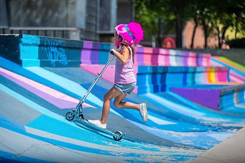 MIKAELA MACKENZIE / WINNIPEG FREE PRESS

Ella Smith, six, takes her scooter for a spin at The Forks in Winnipeg on Tuesday, July 28, 2020. Standup.
Winnipeg Free Press 2020.