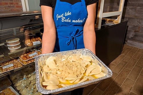 JESSE BOILY  / WINNIPEG FREE PRESS
Amy Teres shows a fresh batch of perogies at Sevalas in Transconca on Tuesday. Tuesday, July 28, 2020.
Reporter: Alison