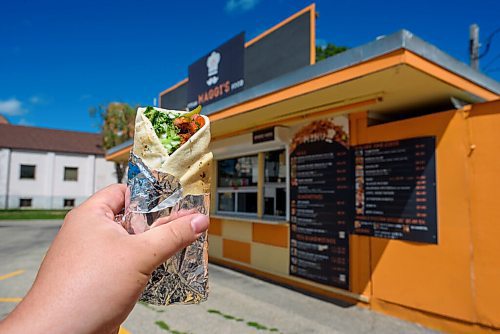 JESSE BOILY  / WINNIPEG FREE PRESS
A Falafel wrap outside Maggis in Transconca on Tuesday. Tuesday, July 28, 2020.
Reporter: Alison