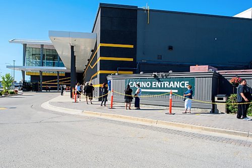 JESSE BOILY  / WINNIPEG FREE PRESS
People line up outside McPhillips Station Casino for its first day of reopening on Wednesday since its closure due to the pandemic . Wednesday, July 29, 2020.
Reporter: Malak Abas