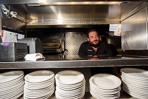 JESSE BOILY  / WINNIPEG FREE PRESS
Giorgo Kodalonis, whos worked in the family business since he was 13, takes an order at Dals Restaurant and Lounge in Transcona on Wednesday. Wednesday, July 29, 2020.
Reporter: Allison