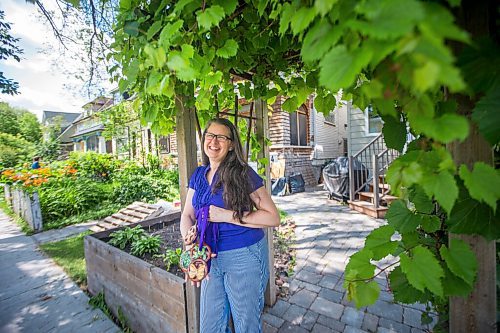 MIKAELA MACKENZIE / WINNIPEG FREE PRESS

Krista Waring, founder and race director for Run 4 Your Cause, poses for a portrait in her yard with handmade finisher medals (made by an artist in Haiti) in Winnipeg on Wednesday, July 29, 2020. The run, which took place virtually last month, is an annual event that raises funds for seven different charities. For Aaron Epp story.
Winnipeg Free Press 2020.