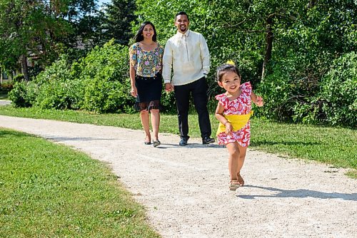 JESSE BOILY  / WINNIPEG FREE PRESS
Godfrey Tamayo walks with his wife, Nicole and daughter Mary, 3, at a park near their home on Wednesday. The family often volunteers at the Philippines pavilion at Folklorama, but this year are finding new things to do.  Wednesday, July 29, 2020.
Reporter: Eva