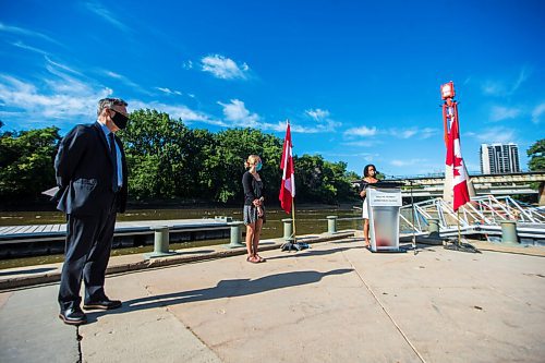 MIKAELA MACKENZIE / WINNIPEG FREE PRESS

U of M Canadian Watershed Information Network coordinator Claire Herbert speaks as MP Terry Duguid (left) and MMF community-based water monitor Bryanna Sherbo listen at a funding announcement for Lake Winnipeg water-quality issues at The Forks in Winnipeg on Thursday, July 30, 2020. For Sarah Lawrynuik story.
Winnipeg Free Press 2020.