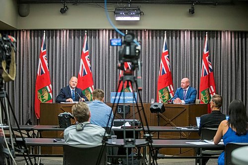 MIKAELA MACKENZIE / WINNIPEG FREE PRESS

Education minister Kelvin Goertzen (left) and Brent Roussin, chief provincial public health officer, speak to the media about the fall back-to-school plan at the Manitoba Legislative Building in Winnipeg on Thursday, July 30, 2020. For Maggie (and Larry?) story.
Winnipeg Free Press 2020.