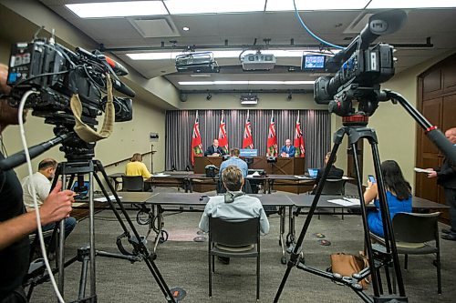 MIKAELA MACKENZIE / WINNIPEG FREE PRESS

Education minister Kelvin Goertzen (left) and Brent Roussin, chief provincial public health officer, speak to the media about the fall back-to-school plan at the Manitoba Legislative Building in Winnipeg on Thursday, July 30, 2020. For Maggie (and Larry?) story.
Winnipeg Free Press 2020.