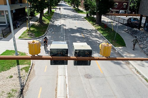 JESSE BOILY  / WINNIPEG FREE PRESS
Cyclists travel under the Midtown bridge along the Assiniboine Ave bike path on Thursday. Thursday, July 30, 2020.
Reporter: Standup