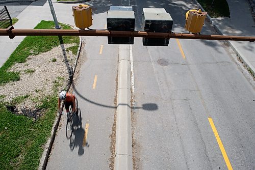 JESSE BOILY  / WINNIPEG FREE PRESS
Cyclists travel under the Midtown bridge along the Assiniboine Ave bike path on Thursday. Thursday, July 30, 2020.
Reporter: Standup