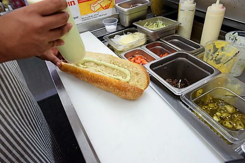 JESSE BOILY  / WINNIPEG FREE PRESS
Sarifal Ridoy makes a sandwiche at Nicks on Broadway on Friday. Friday, July 31, 2020.
Reporter: Sanderson